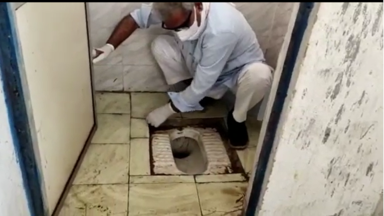 BJP MP cleans toilet with bare hands : video viral.
